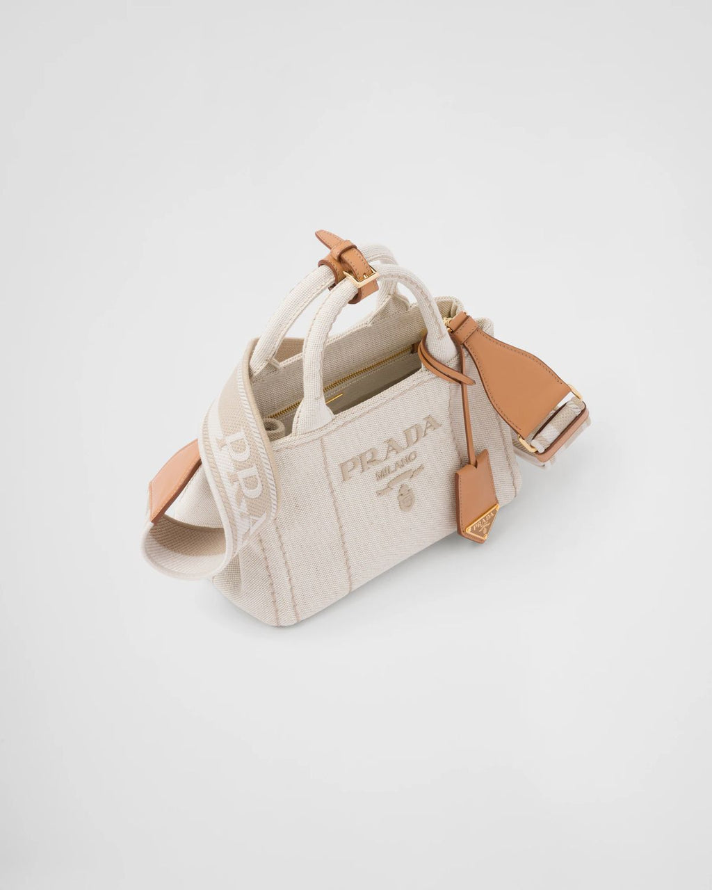 Elegant Cream Canvas Handbag with Brown Leather-Style Accents