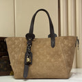 Elegant Beige Monogram Tote Handbag with Dark Brown Handles