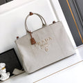 Elegant Beige Canvas Tote Bag with Leather-Style Handles