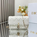 Elegant White Quilted Shoulder Bag with Gold Chain Strap