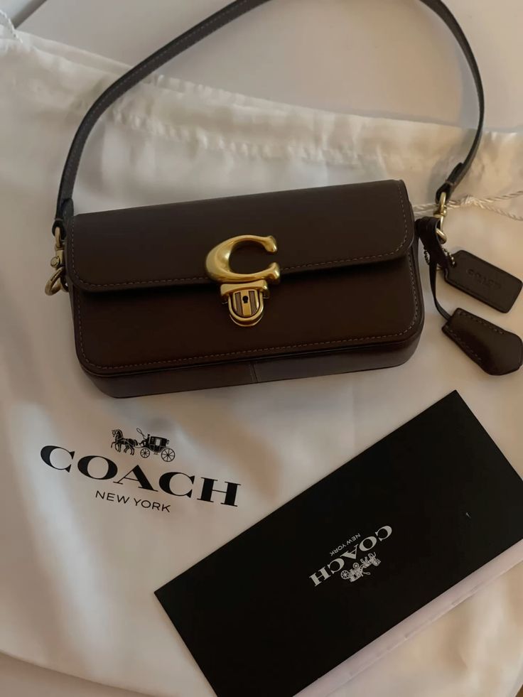 Elegant Chocolate Brown Shoulder Bag with Gold-Tone C Clasp