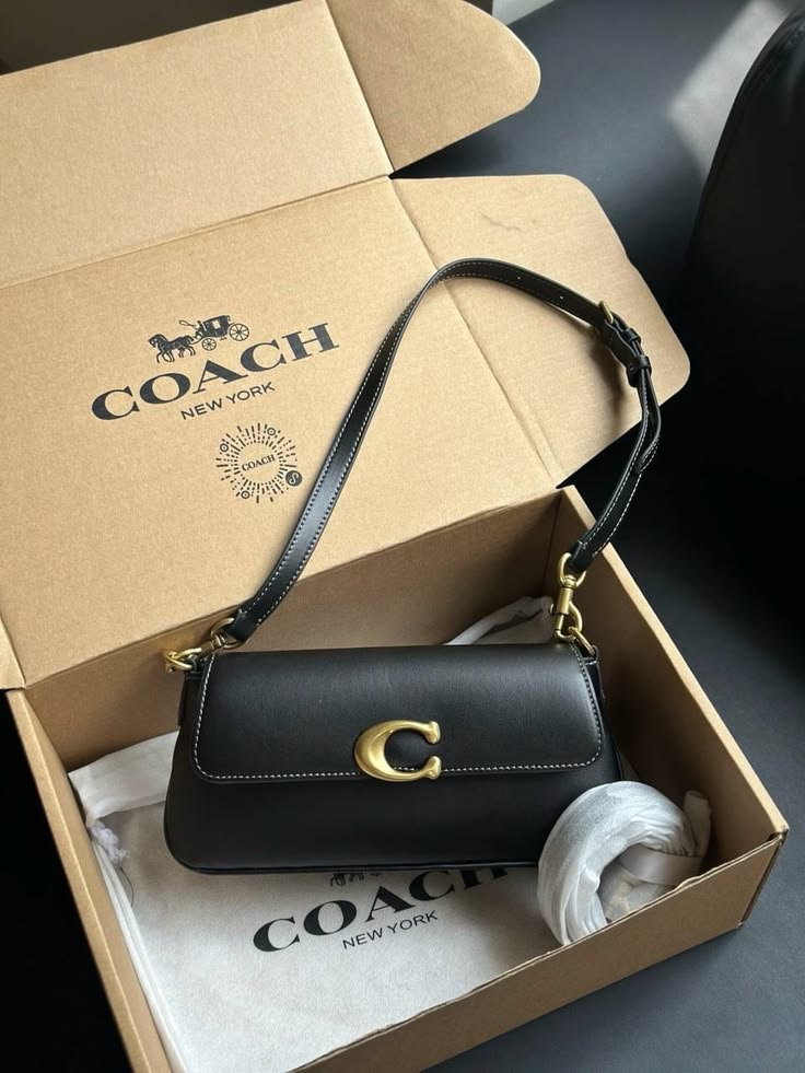Elegant Black Structured Shoulder Bag with Gold-Tone C Clasp