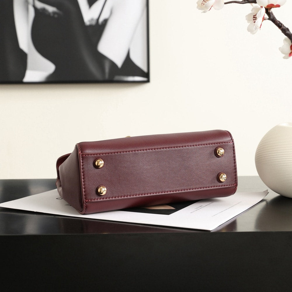 Elegant Burgundy Structured Shoulder Bag with Gold-Tone Clasp