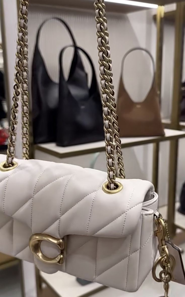 Elegant Cream Quilted Shoulder Bag with Gold-Tone C Clasp