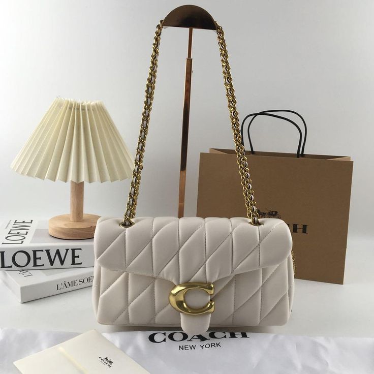 Elegant Cream Quilted Shoulder Bag with Gold-Tone C Clasp