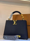 Elegant Black Structured Top-Handle Handbag with Gold V-Clasp