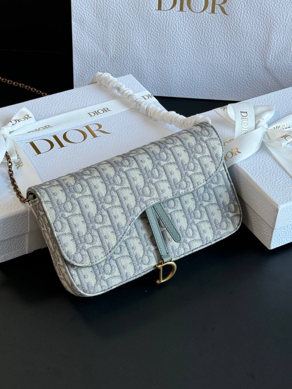 Elegant Grey Monogram Shoulder Bag with Gold-Tone D Clasp