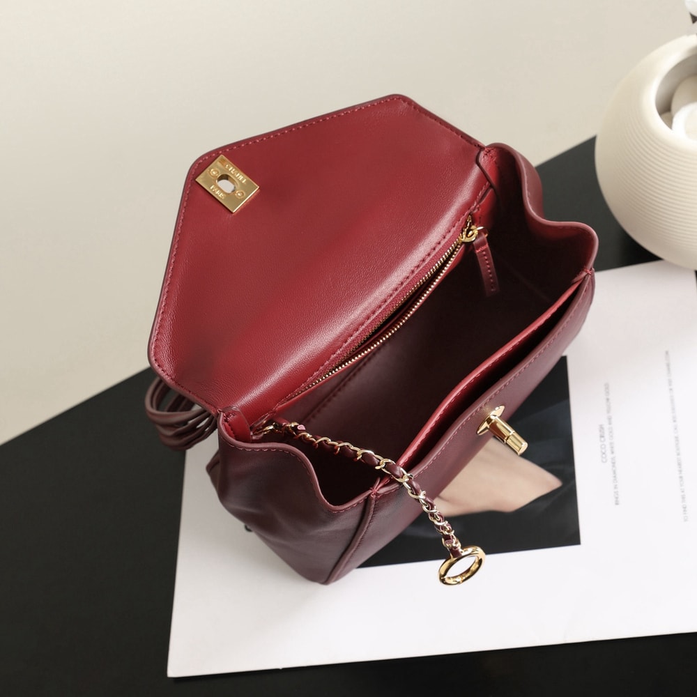 Elegant Burgundy Structured Shoulder Bag with Gold-Tone Clasp