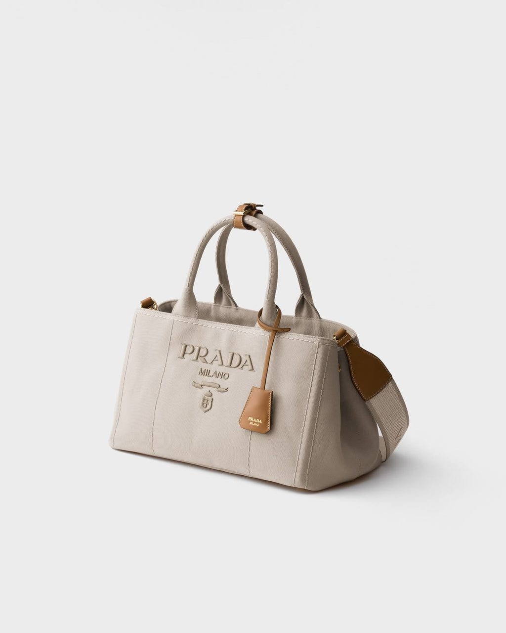 Elegant Cream Canvas Handbag with Brown Leather-Style Accents