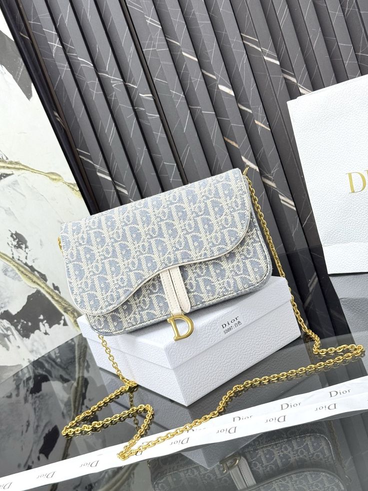 Elegant Grey Monogram Shoulder Bag with Gold-Tone D Clasp