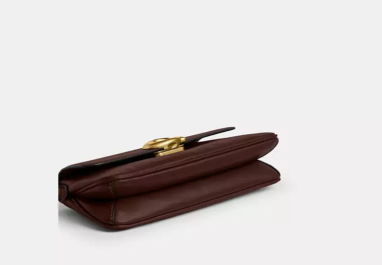 Elegant Chocolate Brown Shoulder Bag with Gold-Tone C Clasp