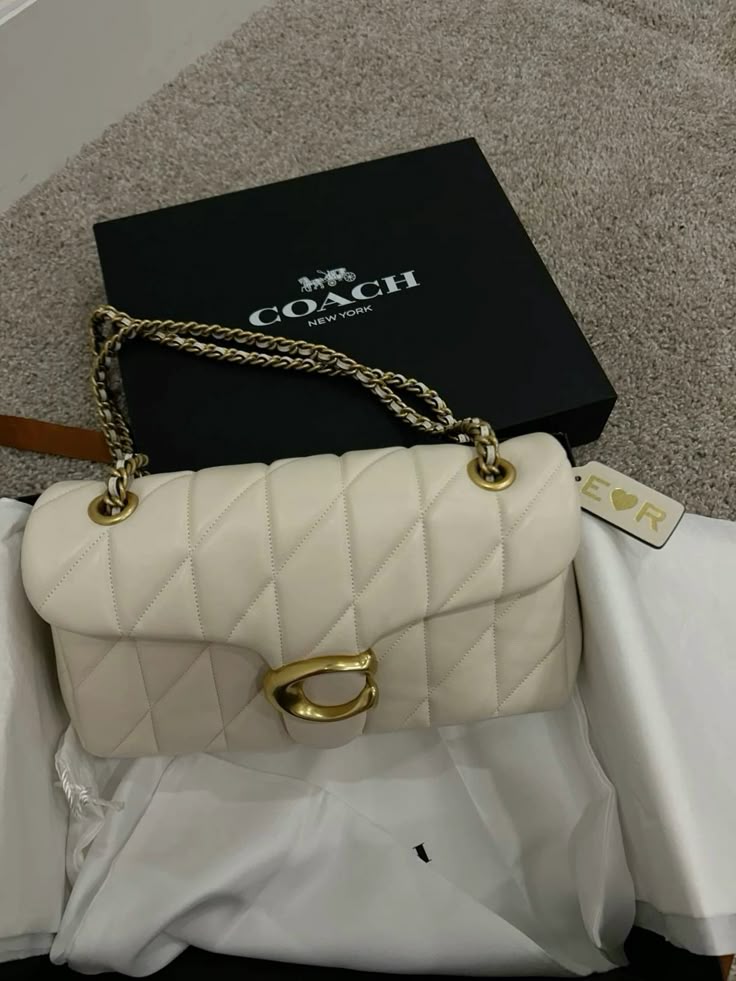 Elegant Cream Quilted Shoulder Bag with Gold-Tone C Clasp
