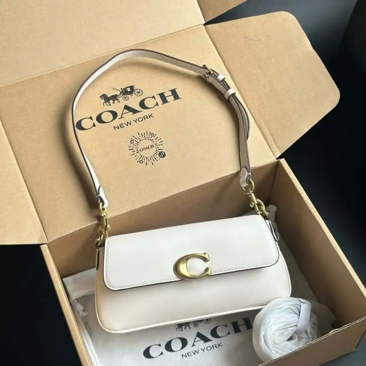 Elegant Cream Shoulder Bag with Gold-Tone C Clasp