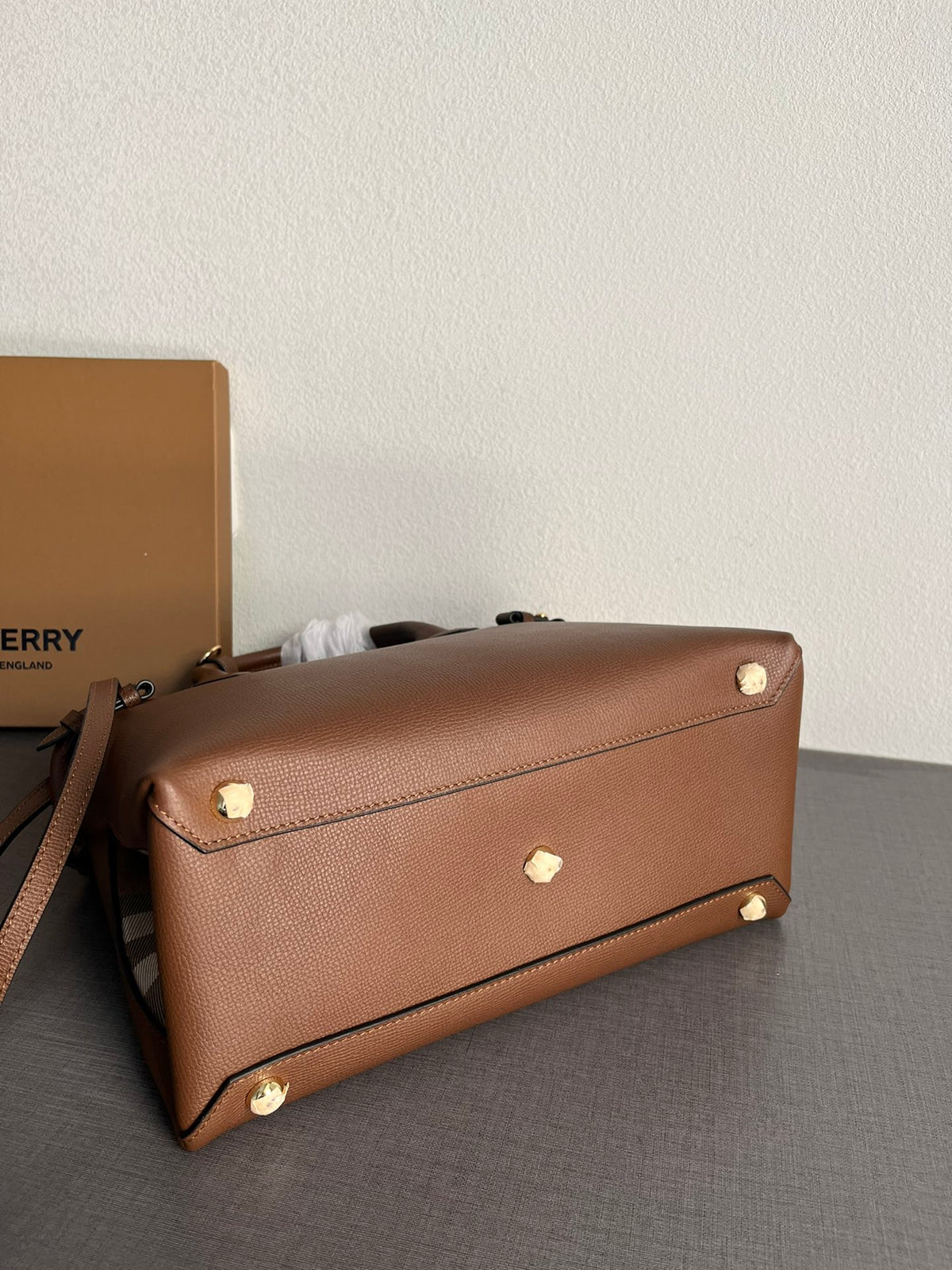 Elegant Brown Structured Handbag with Leather-Style Handles