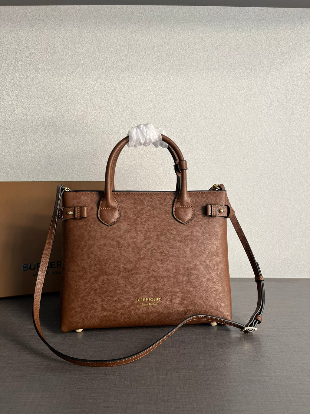 Elegant Brown Structured Handbag with Leather-Style Handles