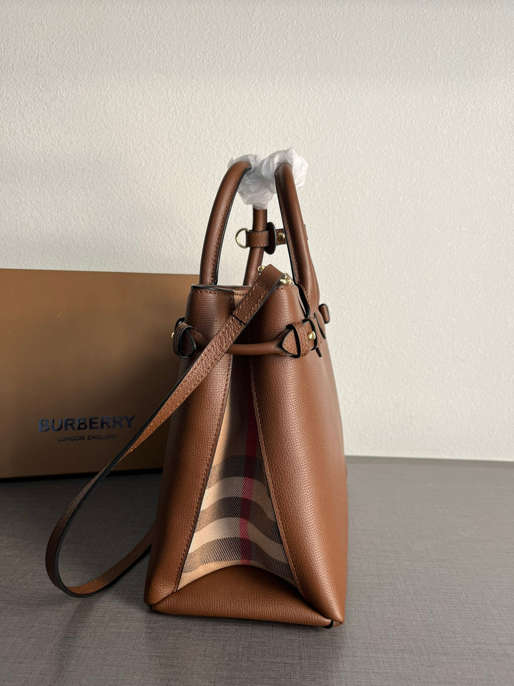 Elegant Brown Structured Handbag with Leather-Style Handles