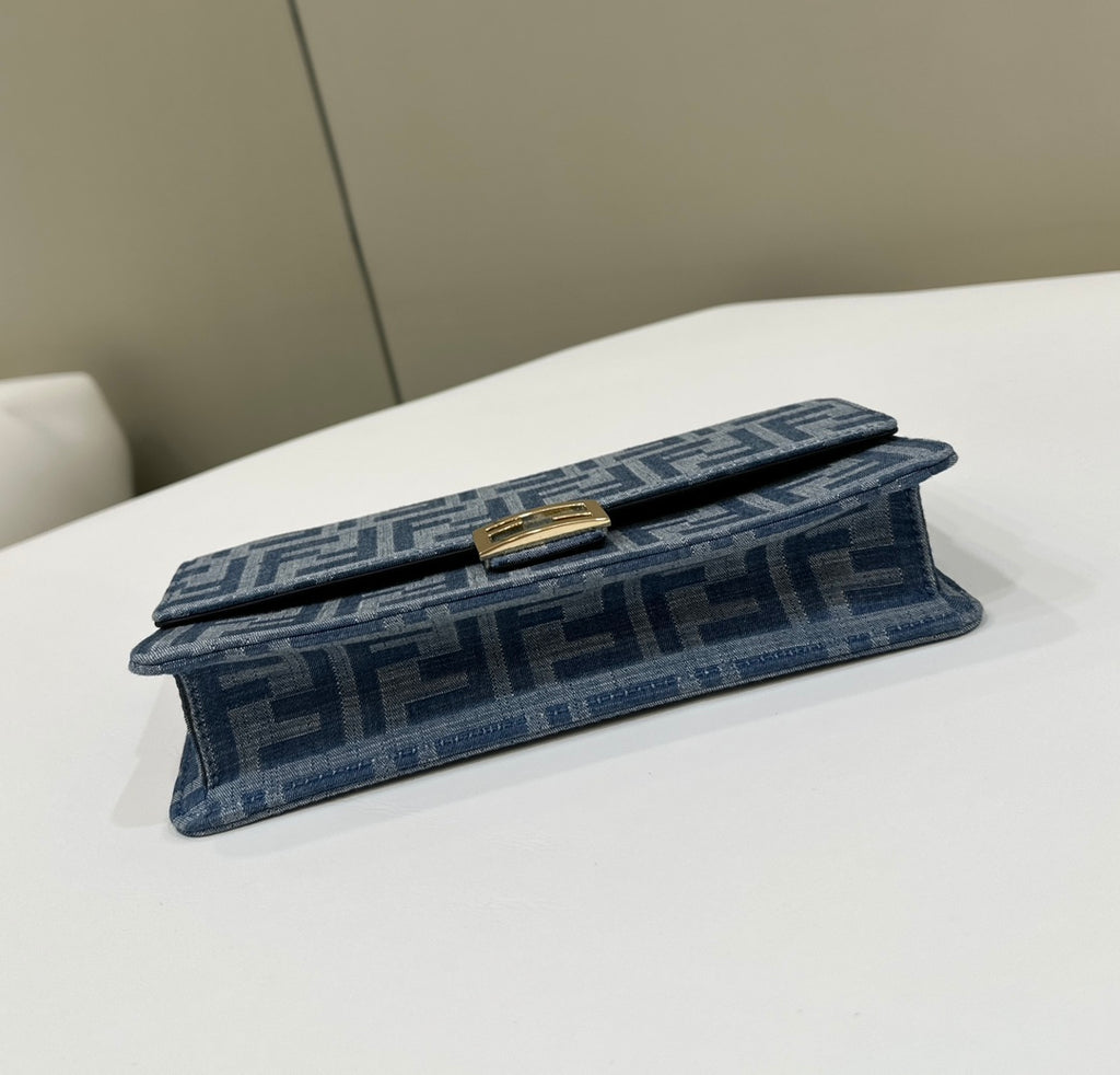 Elegant Blue Monogram Shoulder Bag with Gold-Tone Clasp and Chain Strap