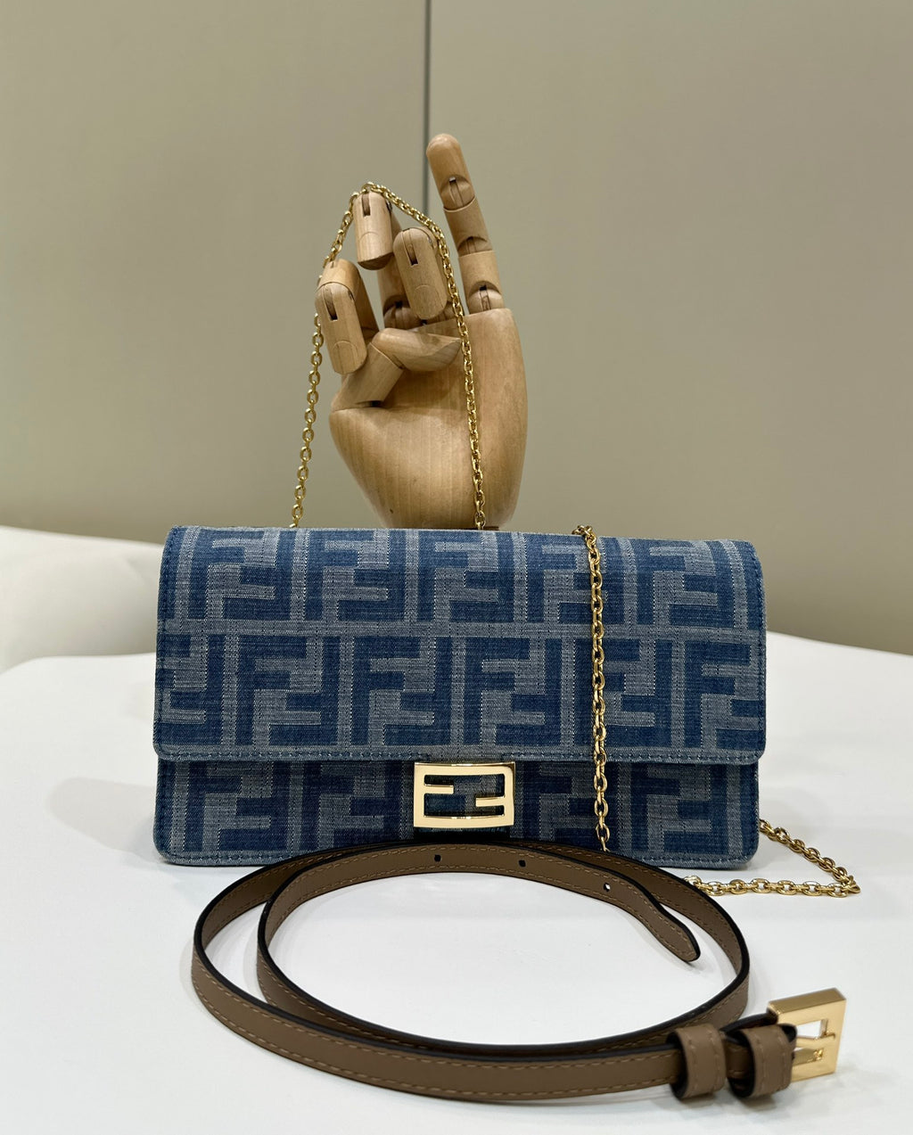 Elegant Blue Monogram Shoulder Bag with Gold-Tone Clasp and Chain Strap